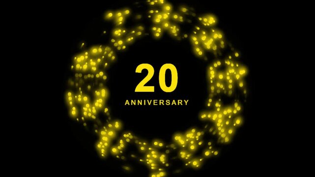 20th anniversary celebration with glowing golden bokeh particles on black background
