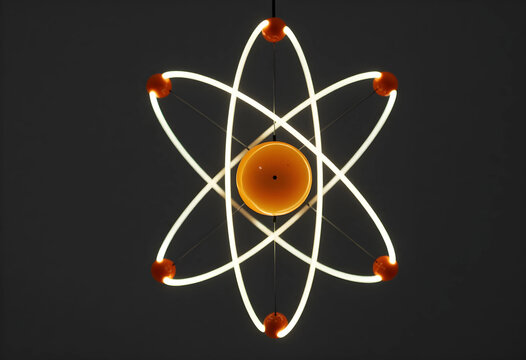 Science and innovation concept glowing atom model with orbiting electrons for physics research education nuclear energy and technology development