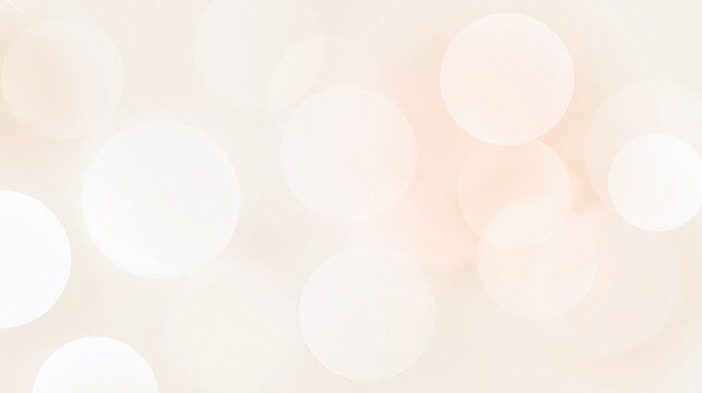 Soft champagne pink light circles glowing against a blurred background with elegant bokeh effect