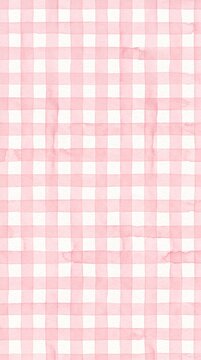 Pink watercolor gingham checkered pattern with soft hand painted texture on white paper for backgrounds and festive designs