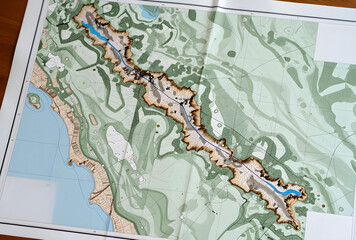 Fototapeta premium Navigation and orienteering, topographic map with mountain range and river path for hiking adventure planning and outdoor exploration in wilderness