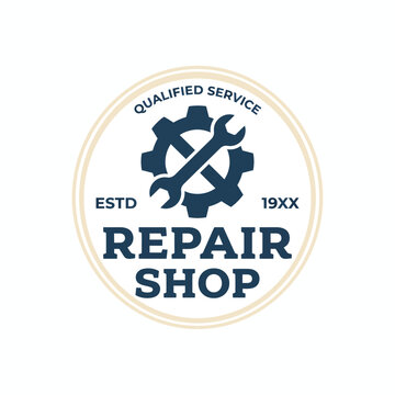 A logo design showcasing a gear and crossed wrenches, symbolizing trust and expertise in repair services, suitable for mechanics or repair shops.