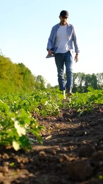 Farmer in the field. Selective focus.