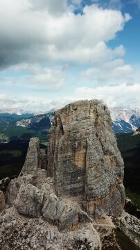 Vertical view of a rugged Dolomites rock tower in the Dolomites Italy