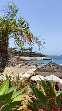 Coastal view of El Duque beach in Costa Adeje, Tenerife, Canary Islands, Spain. Travel or vacation concept,4K.