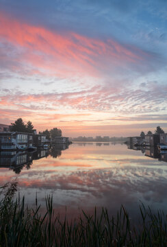 A tranquil, foggy dawn at the lake in Meerstad, Groningen.