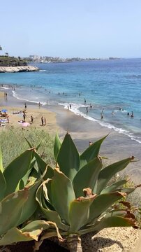 Coastal view of El Duque beach in Costa Adeje, Tenerife, Canary Islands, Spain. Travel or vacation concept,4K.