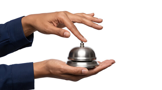 Polished steel reception bell tapped by a fingertip while balanced on an open palm in navy sleeves as an isolated PNG with transparent background