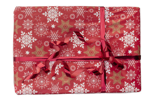 Wrapped red Christmas gift box with snowflake pattern and ribbon isolated on transparent background