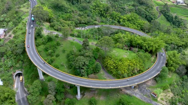 La Estampilla Curved Viaduct near Manizales, Colombia. Establishing Shot. Aerial View.