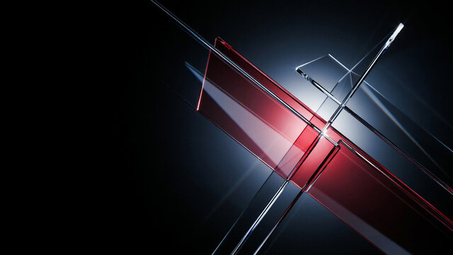 Transparent glass rectangular panels intersecting with red and blue light refractions on dark