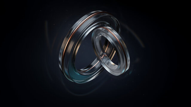 Close-up of two interlocking transparent rings with metallic copper accents and subtle light reflections on dark