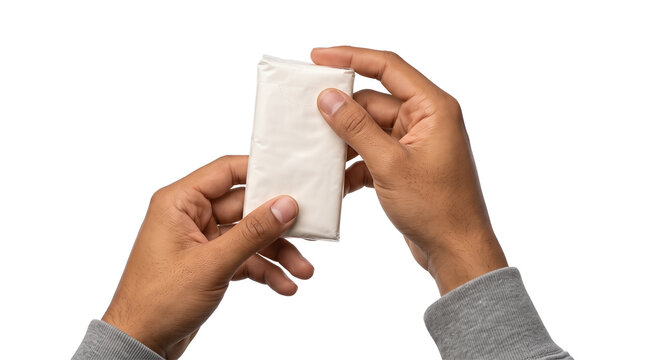 Pack in smooth cream white plastic wrap with a stitched flap held upright by male hands in gray sleeves as an isolated PNG on a transparent background