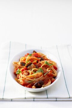 Spaghetti Napoli with tomato sauce, eggplant, black olives