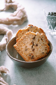 Banana-carrot bread with blueberries slices in a bowl