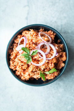 Vegan mett made from rice wafers, tomato paste, onions, and spices