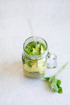 Ginger lemonade with mint in a glass jar