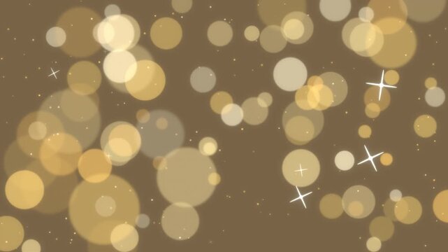 暖色の金色の玉ボケがゆっくり漂い十字の星が灯っては消えるキラキラ背景のループ映像