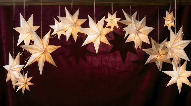 A beautiful display of illuminated christmas stars hanging from the ceiling