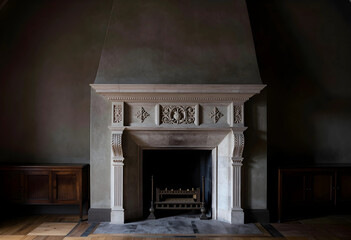Fototapeta premium Luxury interior design and home comfort, ornate stone fireplace in a dark moody living room with vintage wooden cabinets and classic architectural style