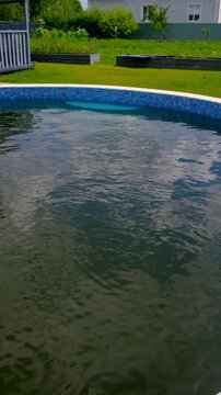 The water in the pool is dirty. Selective focus.