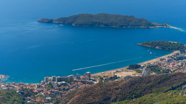 Aerial view of green island and sandy beach on the Adriatic coast