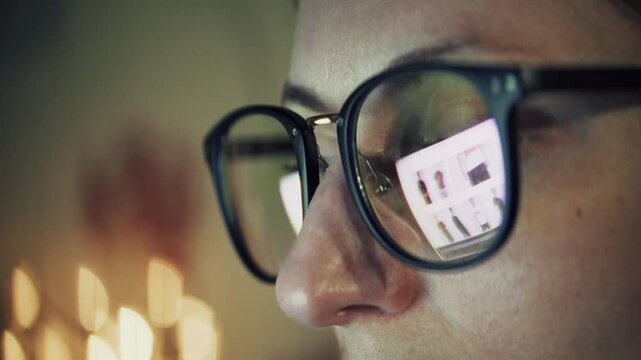 Reflecting Computer Screen While Person Working Indoors
