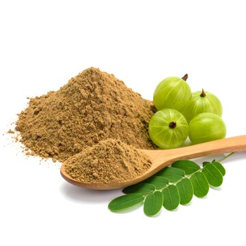 Heap of dried amla powder with  amla fruit and leaf on white background