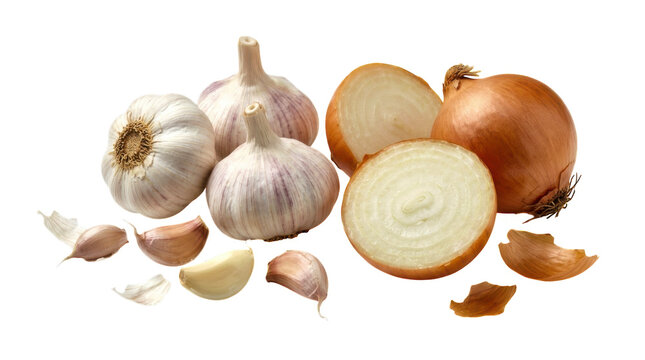 Fresh garlic bulbs and sliced yellow onions for healthy cooking