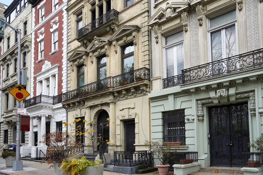Old New York City apartment buildings with ornate decorative stonework