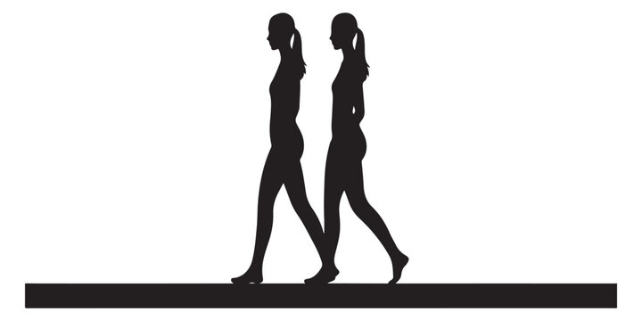 Silhouette of two women walking on narrow balance beam highlights focus and stability during exercise routines or fitness training concepts.