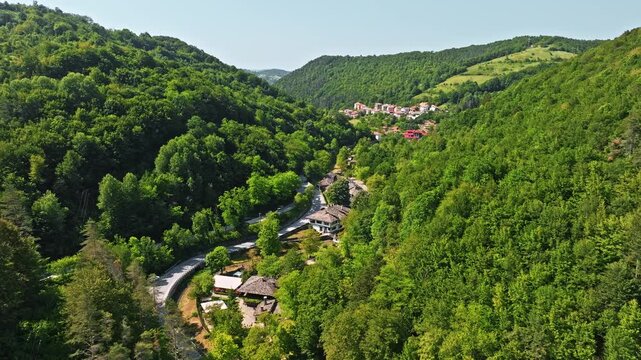 Etar Ethnographic Open Air Museum aerial view valley forest Gabrovo Bulgaria craft village travel tourism stock footage