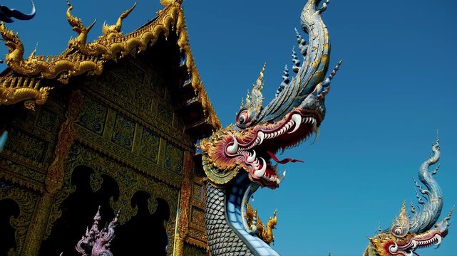 Naga serpent sculpture at wat rong suea ten in thailand