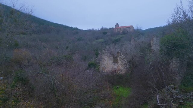 Aerial view from drone of the church of San Esteban in the abandoned village of Ribera in the Valderejo Natural Park. Municipality of Valdegov&iacute;a. Province of &Aacute;lava. Basque Country. Spain. Europe