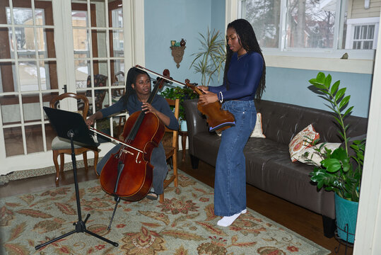Teenage girls practicing music