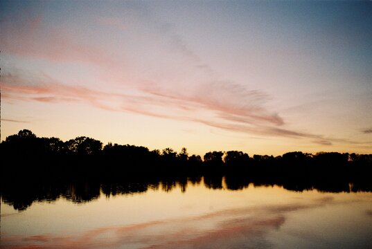 Pastel Sunset Reflected in a Still Lake