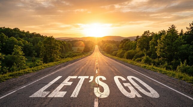 Inspirational road with lets go text leading towards a bright sunset