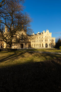 Lednice Chateau architecture with bare tree on a sunny day