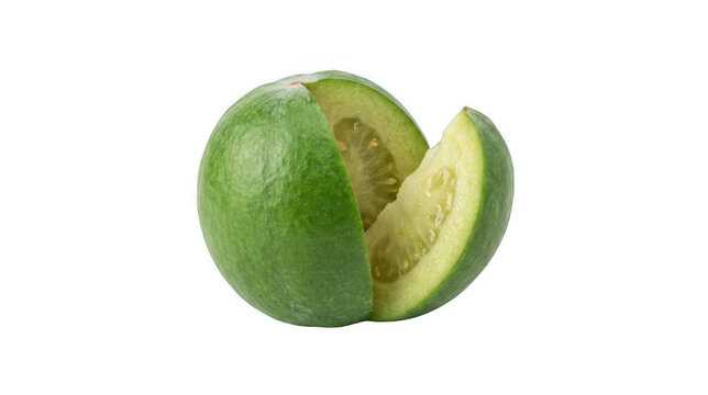 A whole green lime with a slice cut out on transparent background