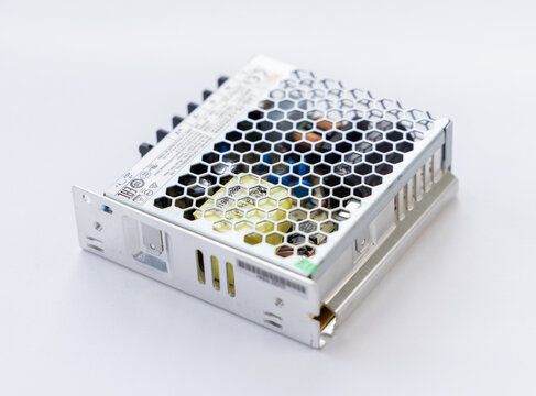Industrial electronic switching power supply with protective metal mesh cover