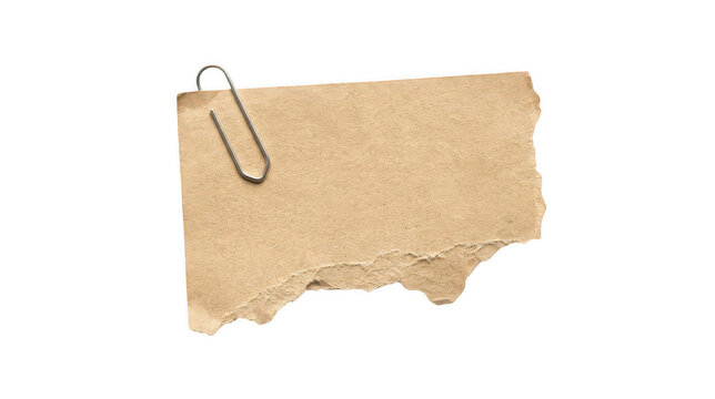 Old torn brown paper scrap with metal paperclip isolated on transparent background.
