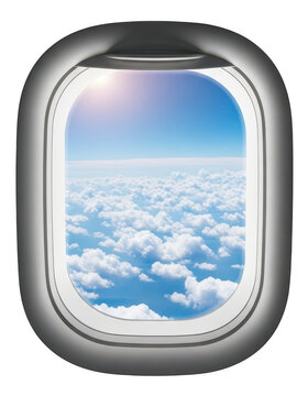 Airplane window view showing blue sky and white fluffy clouds from above