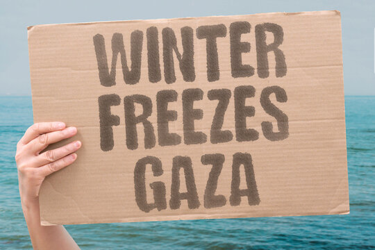 "Winter freezes Gaza" Displaced families shiver in flimsy tents. GAZA. WINTER. TENTS. DISPLACED. COLD.