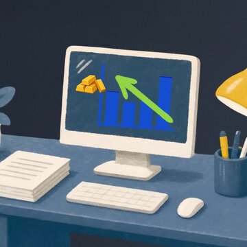 monitor and computer work desk with computer screen rising stock graph