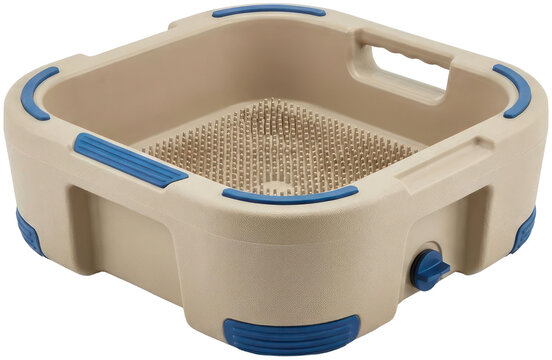 Plastic garden soil sifter on black background.
