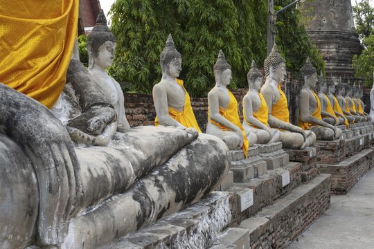 Buddha statues around the Great Chedi Chaya Mongkol, Wat Yai Chai Mongkon, Ayutthaya, Thailand