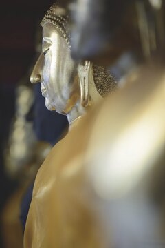 Gilded Buddha statues (Bhumispara-mudra: Gautama Buddha at the moment of enlightenment), Wat Suthat Thepwararam, Royal Temple, Phra Nakhon, Bangkok, Thailand