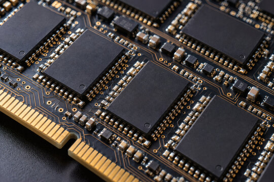 Extreme macro photograph of high speed memory modules mounted on a modern PCB, featuring parallel semiconductor chips, gold contacts, solder joints, intricate circuitry, premium technology detail