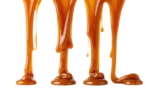 Sweet caramel sauce flowing and dripping down in various rich streams on transparent background