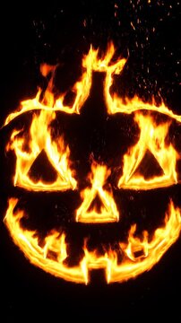 Burning pumpkin jack-o'-lantern with orange flames against black background, lock down
